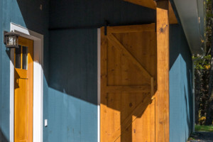 wooden door and blue wall closeup