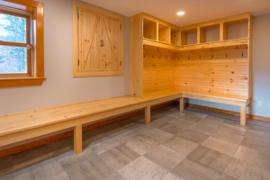 wooden bench and storage with stone floor