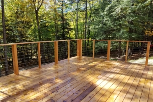 wooden deck overlooking trees