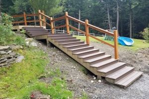wooden steps with green scenery in background